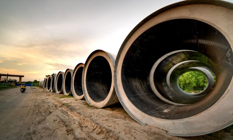 Industrial pipeline under construction across open land