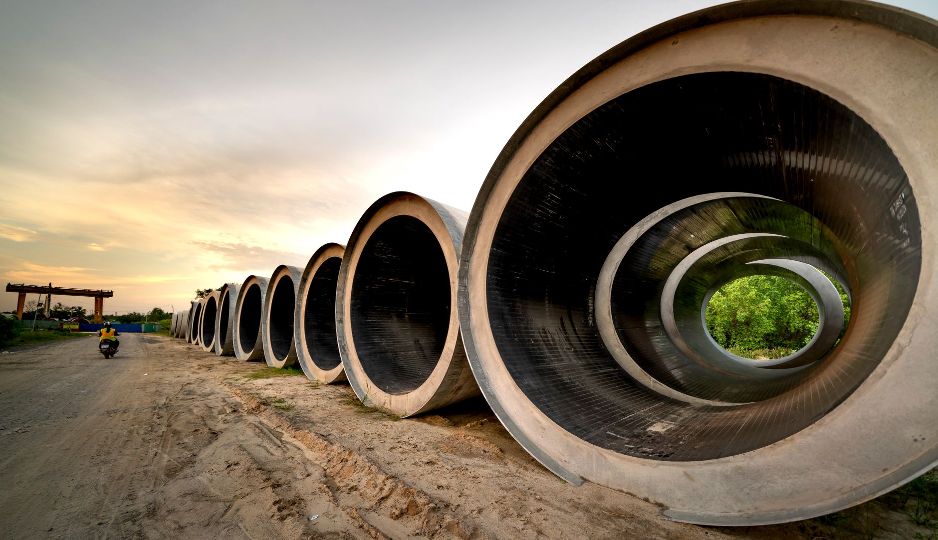 Industrial pipeline under construction across open land