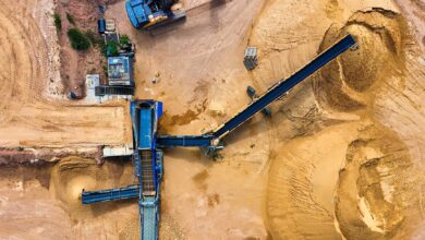 Aerial view of a large open-pit iron ore mining operation