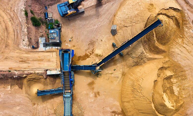 Aerial view of a large open-pit iron ore mining operation