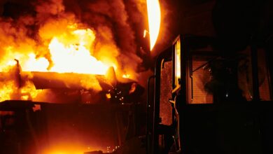 Interior of an industrial zinc smelting facility with molten metal processing equipment