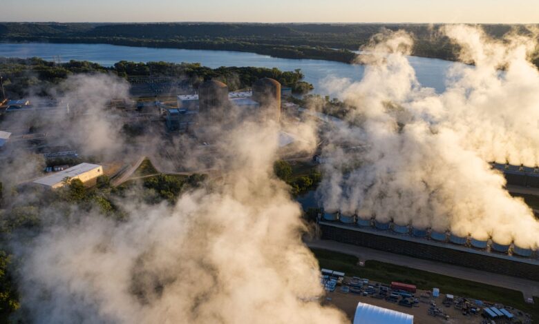 Aerial view of a bulk commodity coal terminal with loading berths along a port waterway