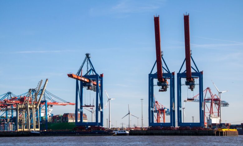 Large industrial chemical storage terminal at a port facility with tank infrastructure