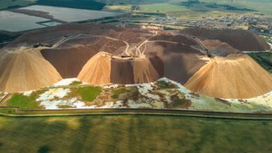 Aerial view of an active potash mine with extraction equipment and mineral deposits