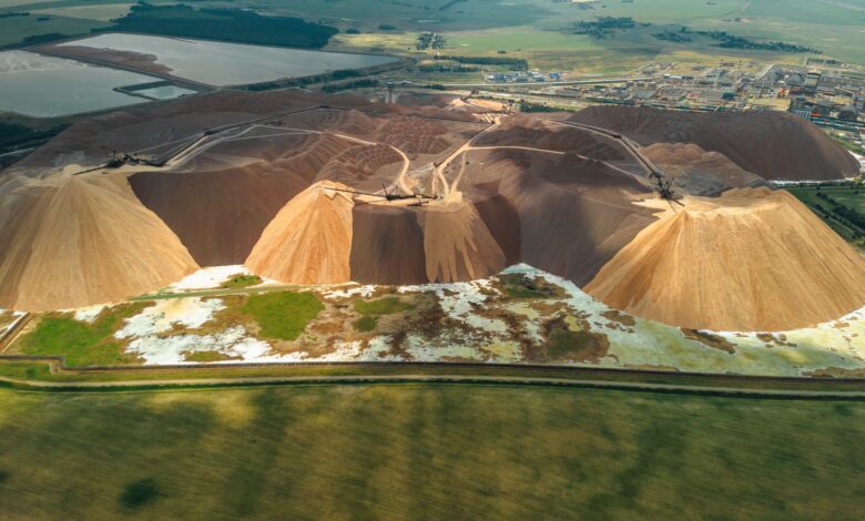 Aerial view of an active potash mine with extraction equipment and mineral deposits