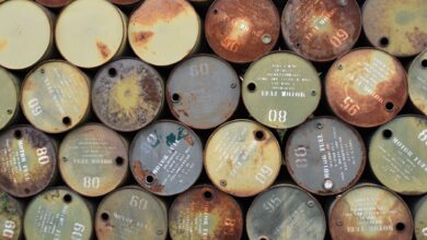 Large crude oil storage tanks at an industrial facility