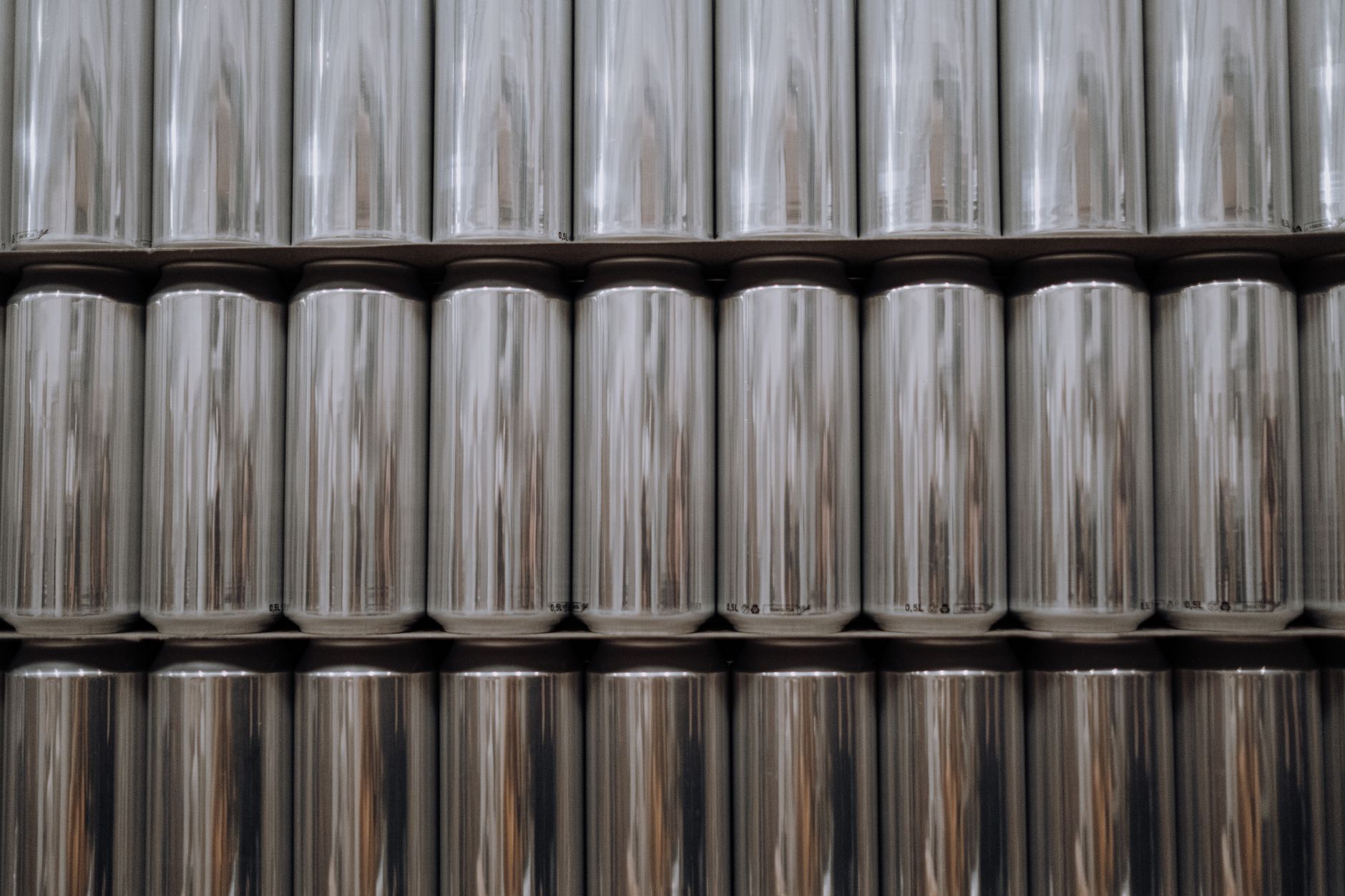 Industrial aluminum production facility with molten metal processing equipment