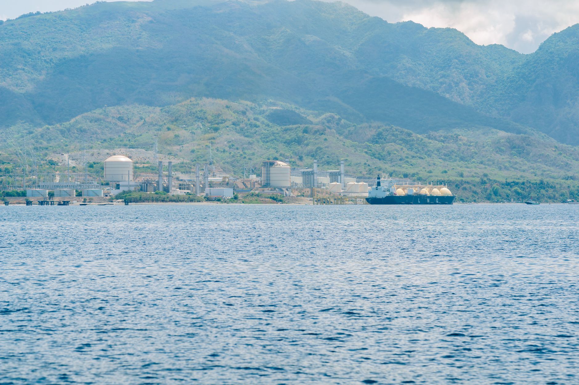 LNG tanker vessel navigating open ocean waters