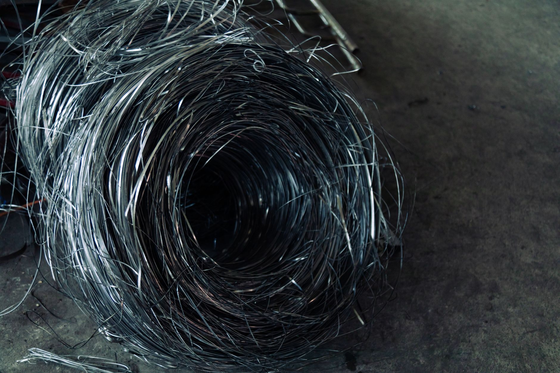 Rolls of refined copper wire at an industrial manufacturing plant