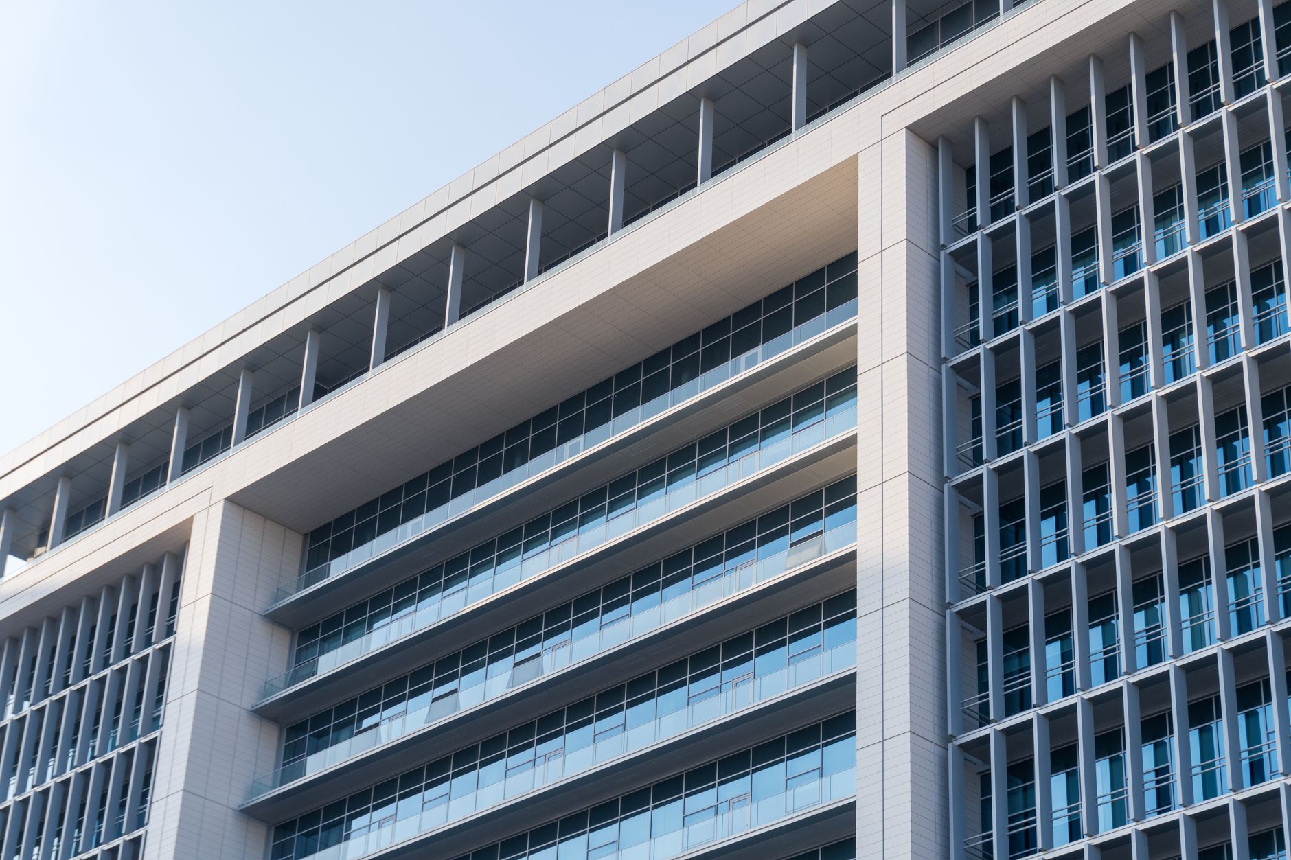Investment professionals reviewing long-term real asset allocation documents